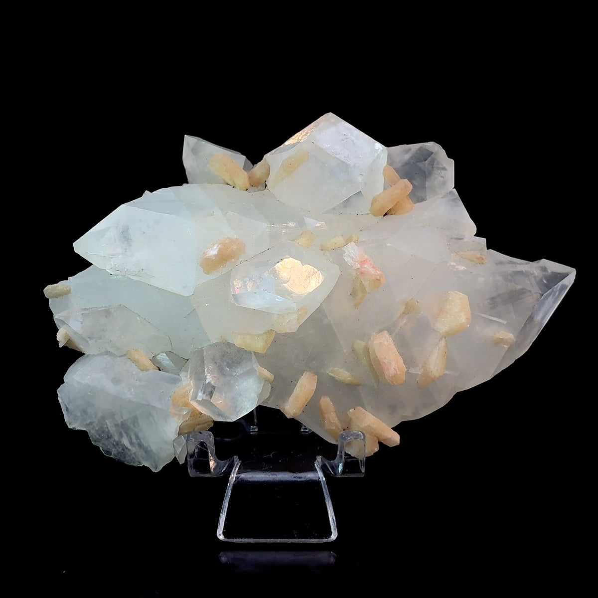 Natural Apophyllite with peach Stilbite crystal specimen from Maharashtra India featuring sparkling pyramid-shaped crystals