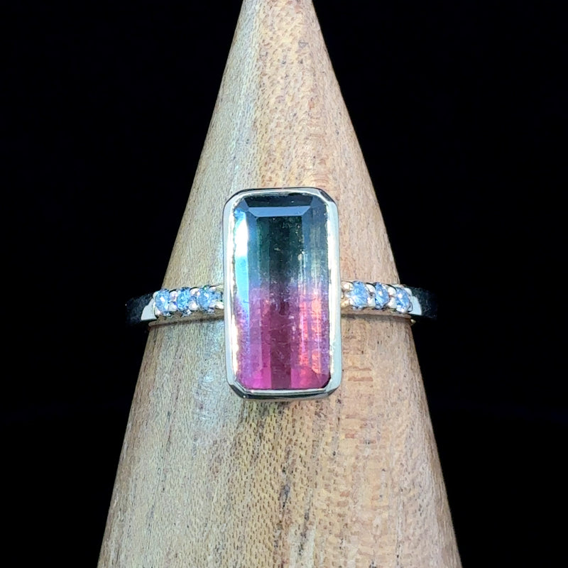 Natural 14K gold bi-color tourmaline ring featuring vibrant pink and green hues with diamond accents. Size 8