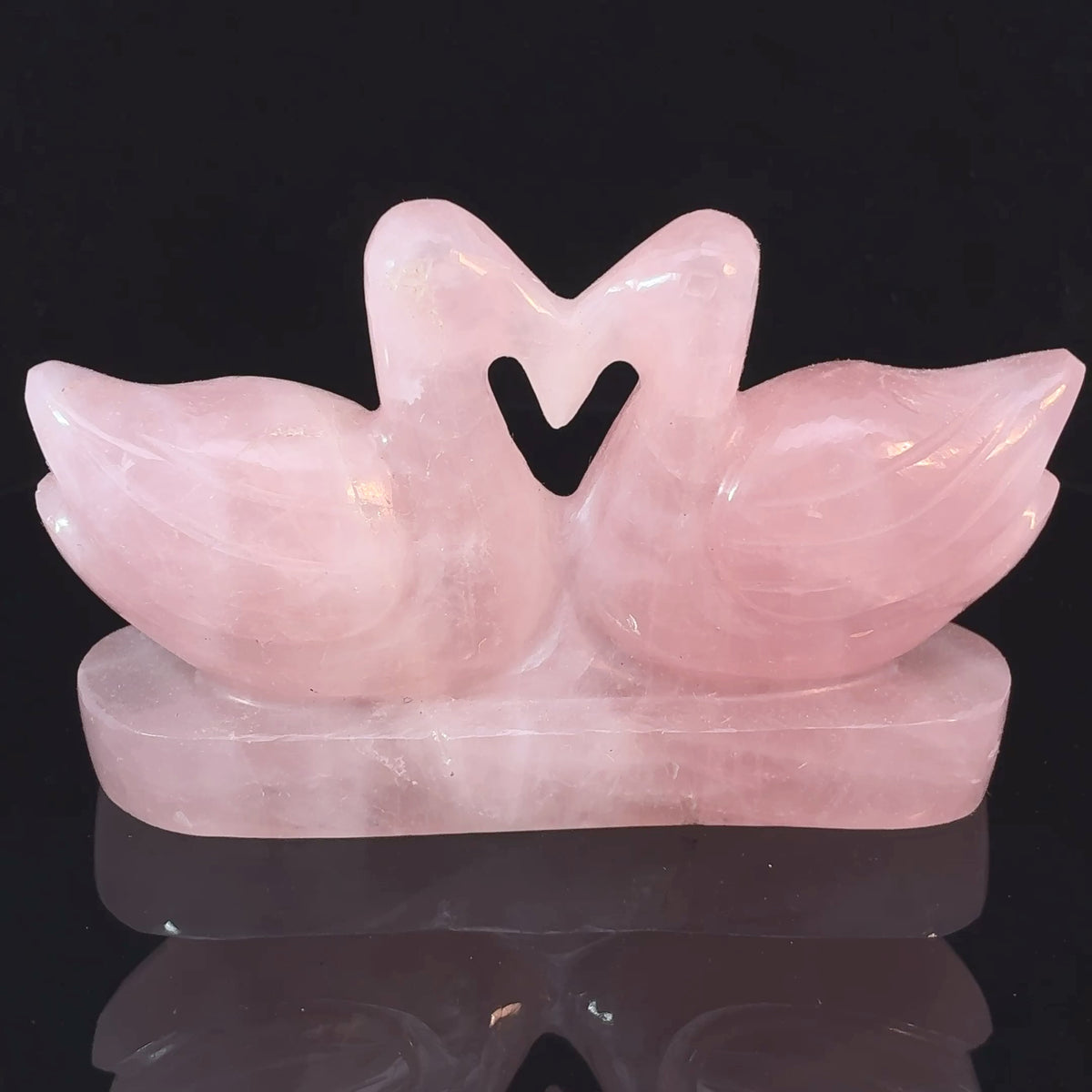 Carved Rose Quartz swan pair facing each other, natural pink crystal sculpture weighing 148 grams