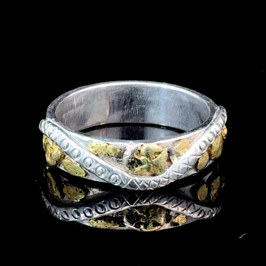 Handmade sterling silver ring with small natural Gold nuggets, hand-engraved details, and hammered band texture
