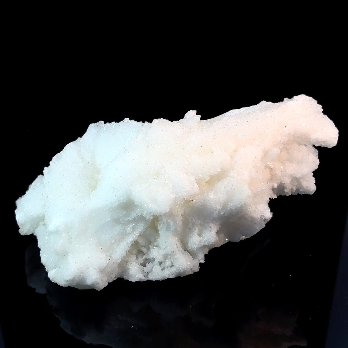 Natural white aragonite crystal specimen from Mexico, 238 grams, measuring 104 x 57 x 50 mm
