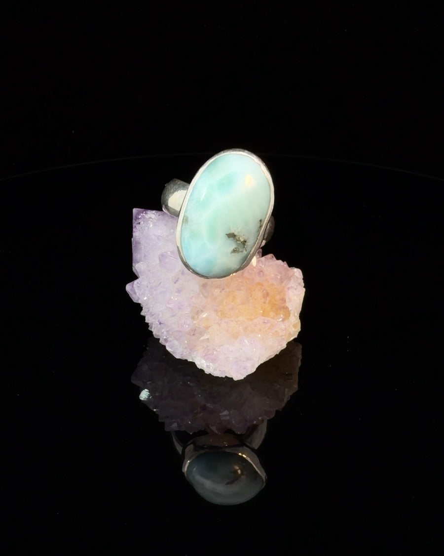 Natural Larimar sterling silver bezel set oval cabochon ring size 6 featuring a rare blue Caribbean gemstone with natural white matrix.