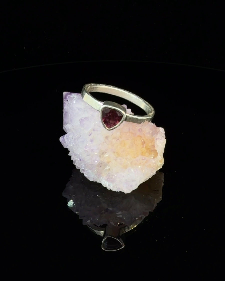 Deep red trillion cut Pink Tourmaline solitaire ring in sterling silver bezel setting with hammered band size 9.5