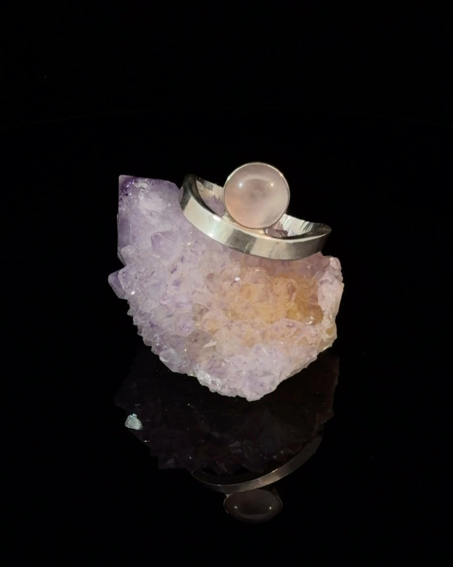 Natural Rose Quartz cabochon sterling silver ring with a polished contemporary wave band, size 7.