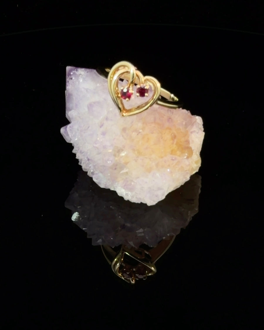 14K gold heart garnet ring featuring two natural faceted garnets on a tapered band, size 6.75.