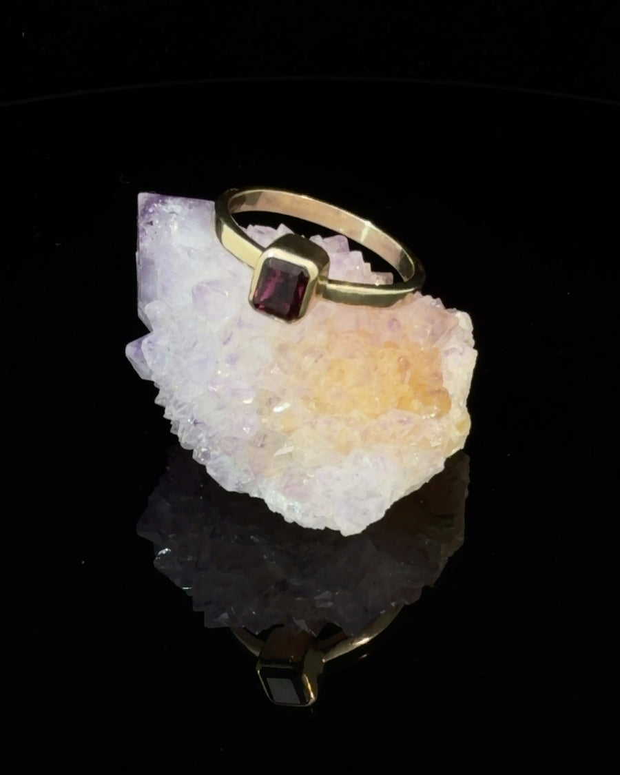 14K gold ring featuring a natural square-cut gem-quality pink tourmaline in a minimalist setting, size 6.5.