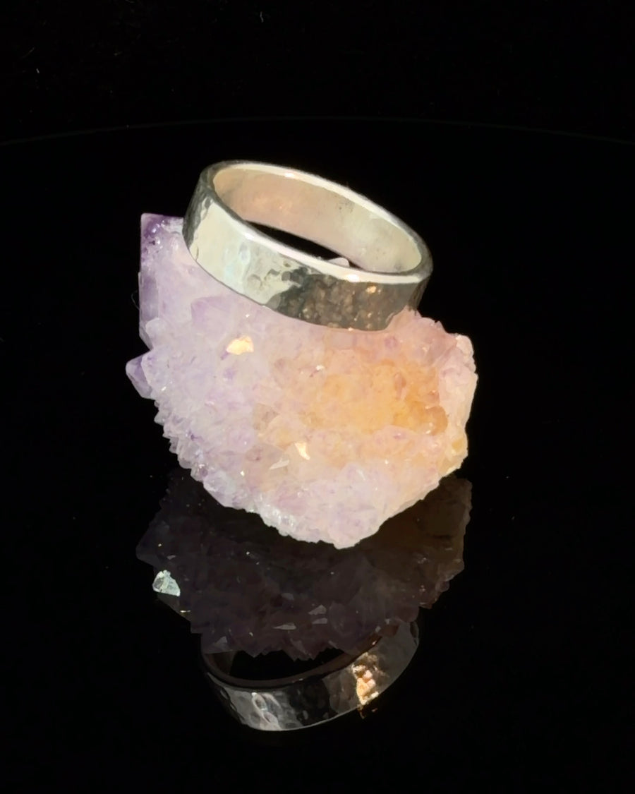 a handcrafted hammered sterling silver band ring in Size 9.