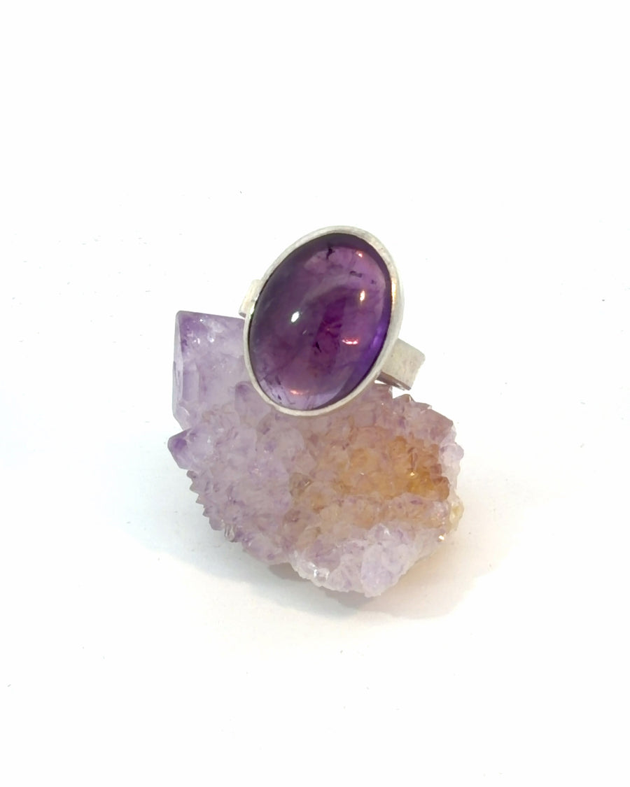 Large natural oval Amethyst cabochon bezel set in sterling silver with a wide hammered band, handcrafted size 6 statement ring.