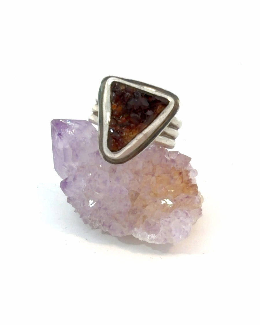 Natural Raw Garnet crystal silver ring with bezel setting and ribbed band, size 6.5, featuring a deep reddish-brown natural Garnet specimen.