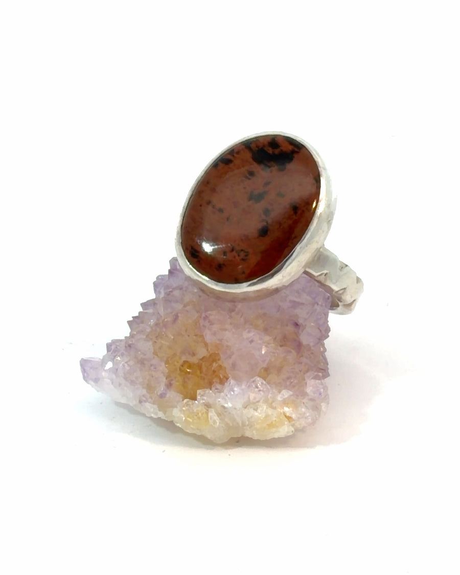 Natural Mahogany Obsidian cabochon bezel set in sterling silver textured band ring size 12 with rich reddish-brown volcanic gemstone.