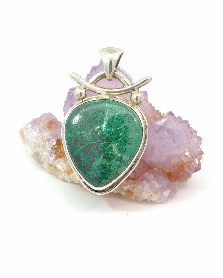 Handcrafted sterling silver Chrysocolla and Malachite pendant featuring a large natural teardrop cabochon in a bezel setting with decorative silver bead accents.
