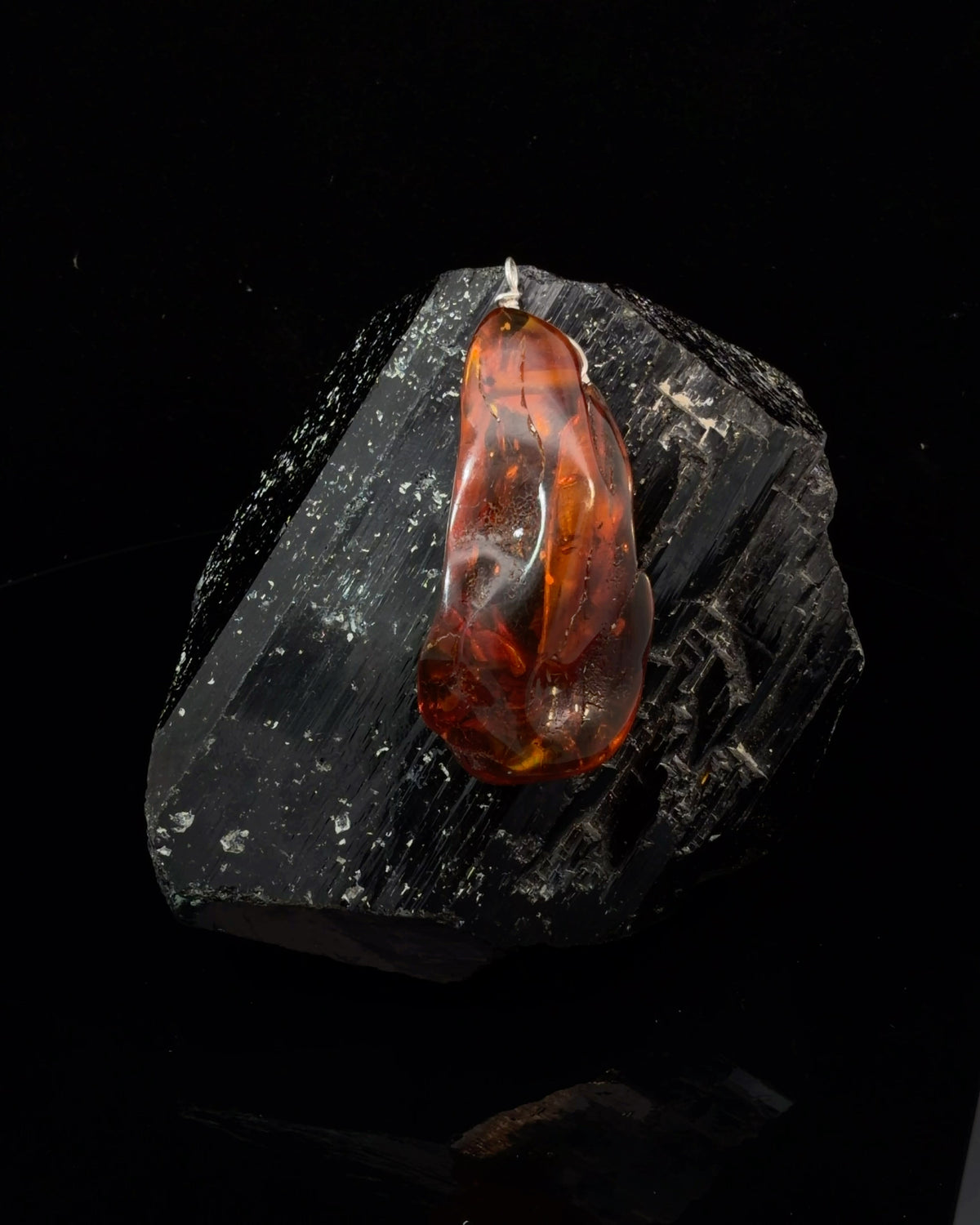 Polished Freeform Amber Pendant with Silver Bail