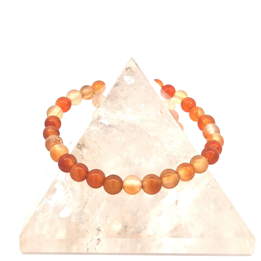Natural Carnelian bead stretch bracelet with vibrant red and orange gemstone beads on durable stretch cord for small to medium wrists.