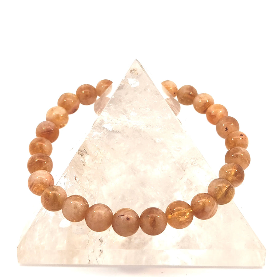 a natural Citrine bead stretch bracelet featuring radiant golden-yellow gemstones.