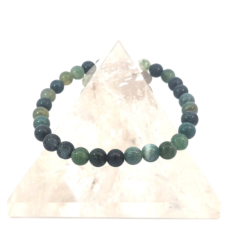 Natural Green Jasper stretch bracelet with polished green gemstone beads on durable elastic cord, crystal jewelry for grounding, balance, and everyday wear.