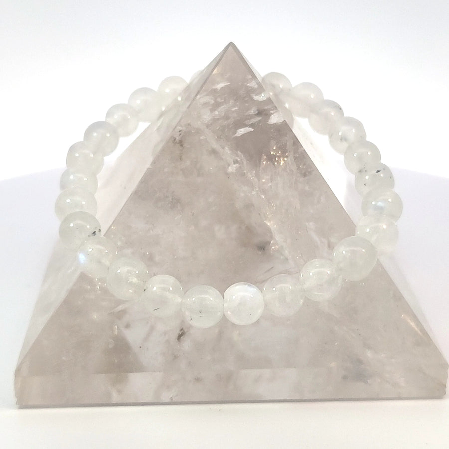 Elegant genuine moonstone bead stretch bracelet with a luminous glow.