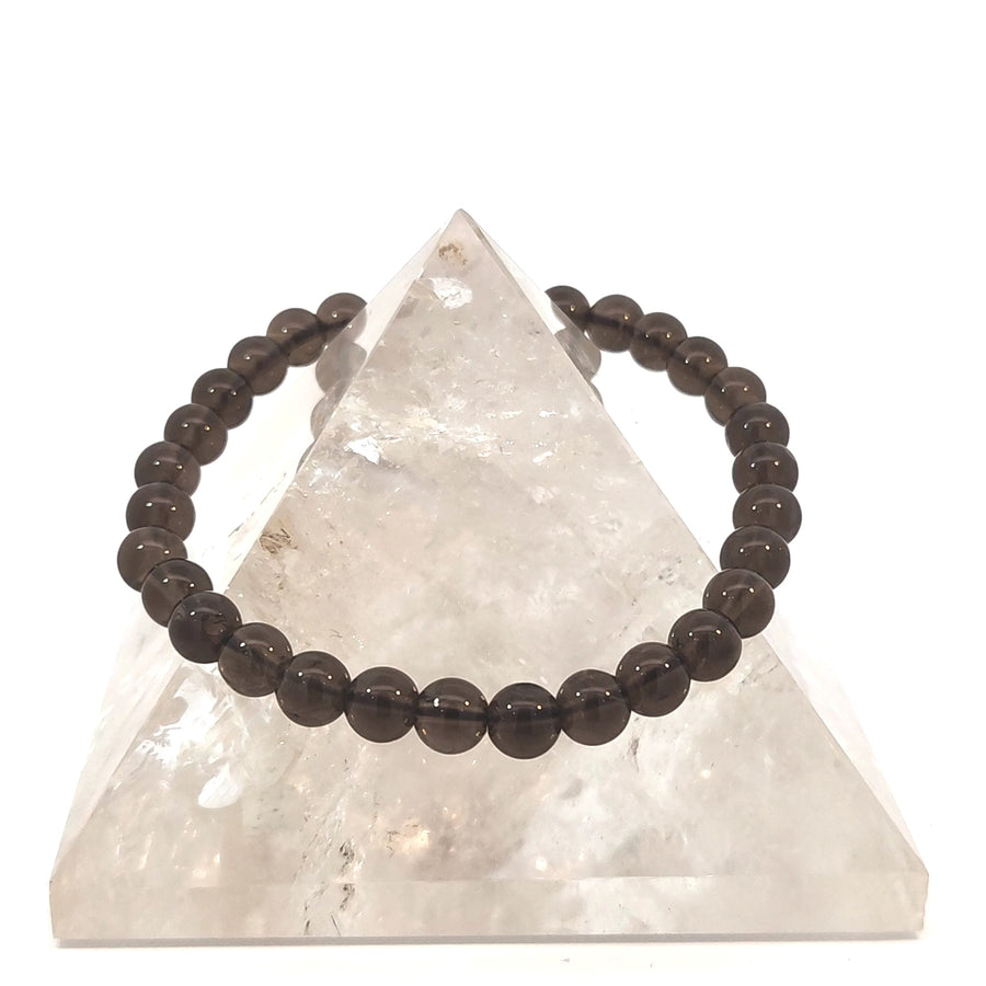 Elegant natural Smoky Quartz stretch bracelet featuring genuine gemstone beads.
