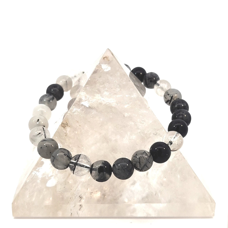 Natural Black Tourmaline in Quartz stretch bracelet with genuine crystal beads on durable elastic cord for small to medium wrists.