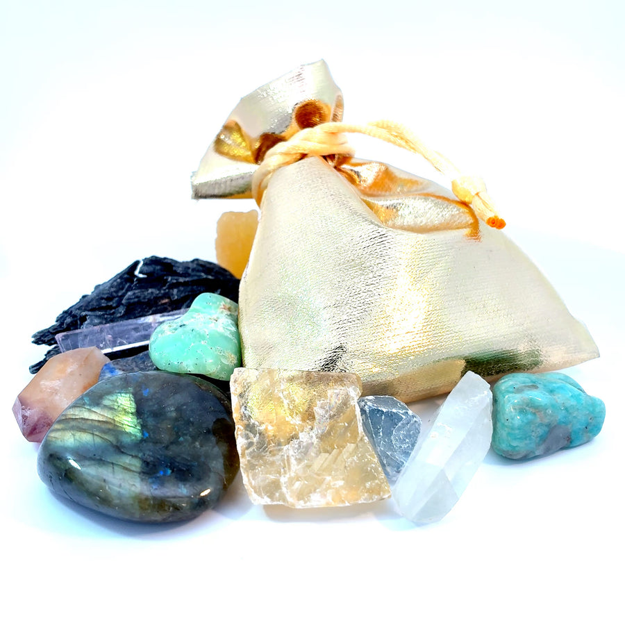 a fun mystery pouch packed with 7–10 natural crystals, tumbled stones, fossils, and minerals.