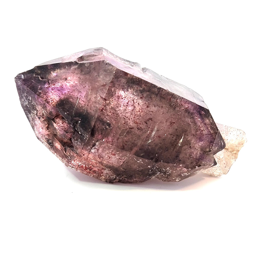 Natural amethyst scepter crystal from Chibuku Zimbabwe with smoky amethyst heads, hematite needle inclusions, and enhydro features weighing 135.7 grams.
