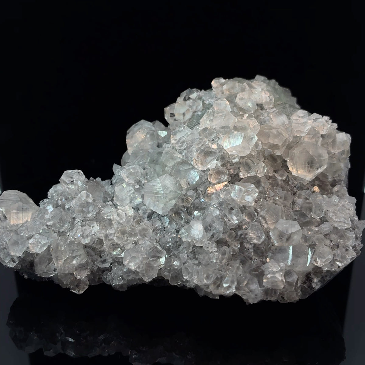 Natural clear calcite crystals with vibrant green fluorite on matrix mineral specimen from China.