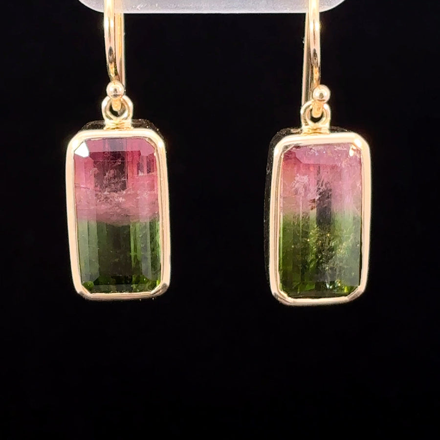 Natural rectangular watermelon tourmaline earrings in 14K gold featuring vibrant pink and green bi-color gemstones.