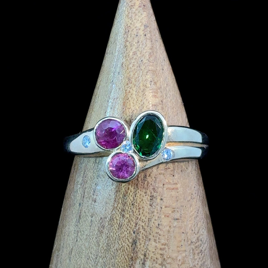 14K gold cluster ring with two natural pink tourmalines, one oval green tourmaline, and three flush-set diamond accents, size 6.5.
