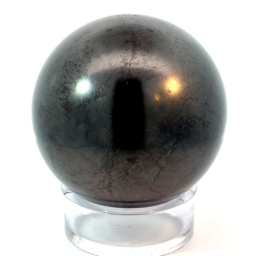 Natural 60mm polished Shungite sphere from Russia weighing approximately 300 grams, black carbon-rich mineral crystal for collectors, meditation, and energy work.
