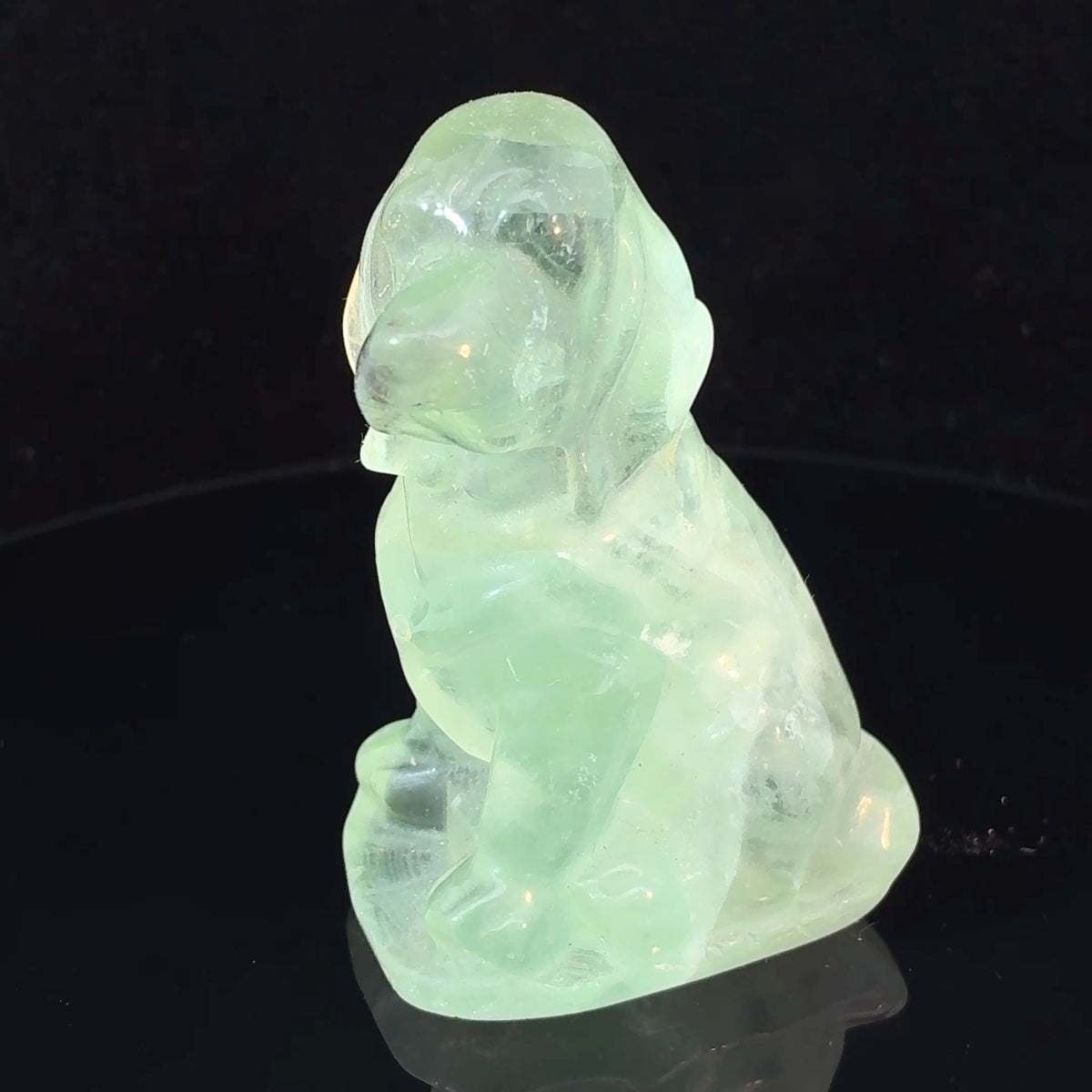 Carved green fluorite dog made from natural Chinese fluorite, 105 grams, measuring 64 x 43 x 32 mm