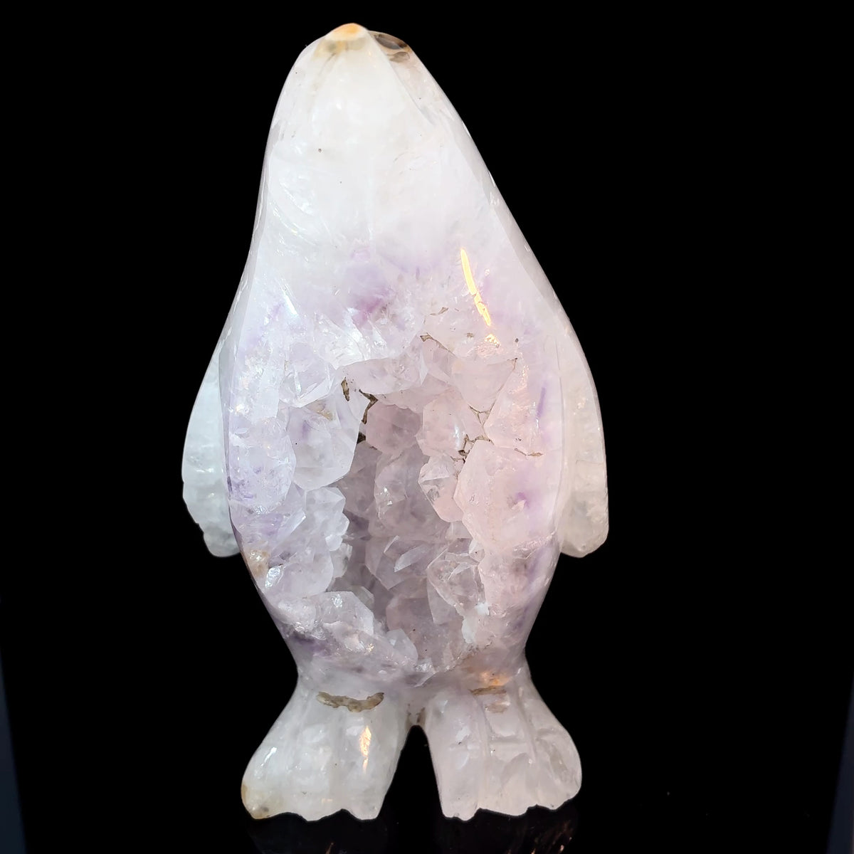 Carved amethyst penguin from Brazil with exposed raw crystal center, 287 grams, 102 x 59 x 43 mm